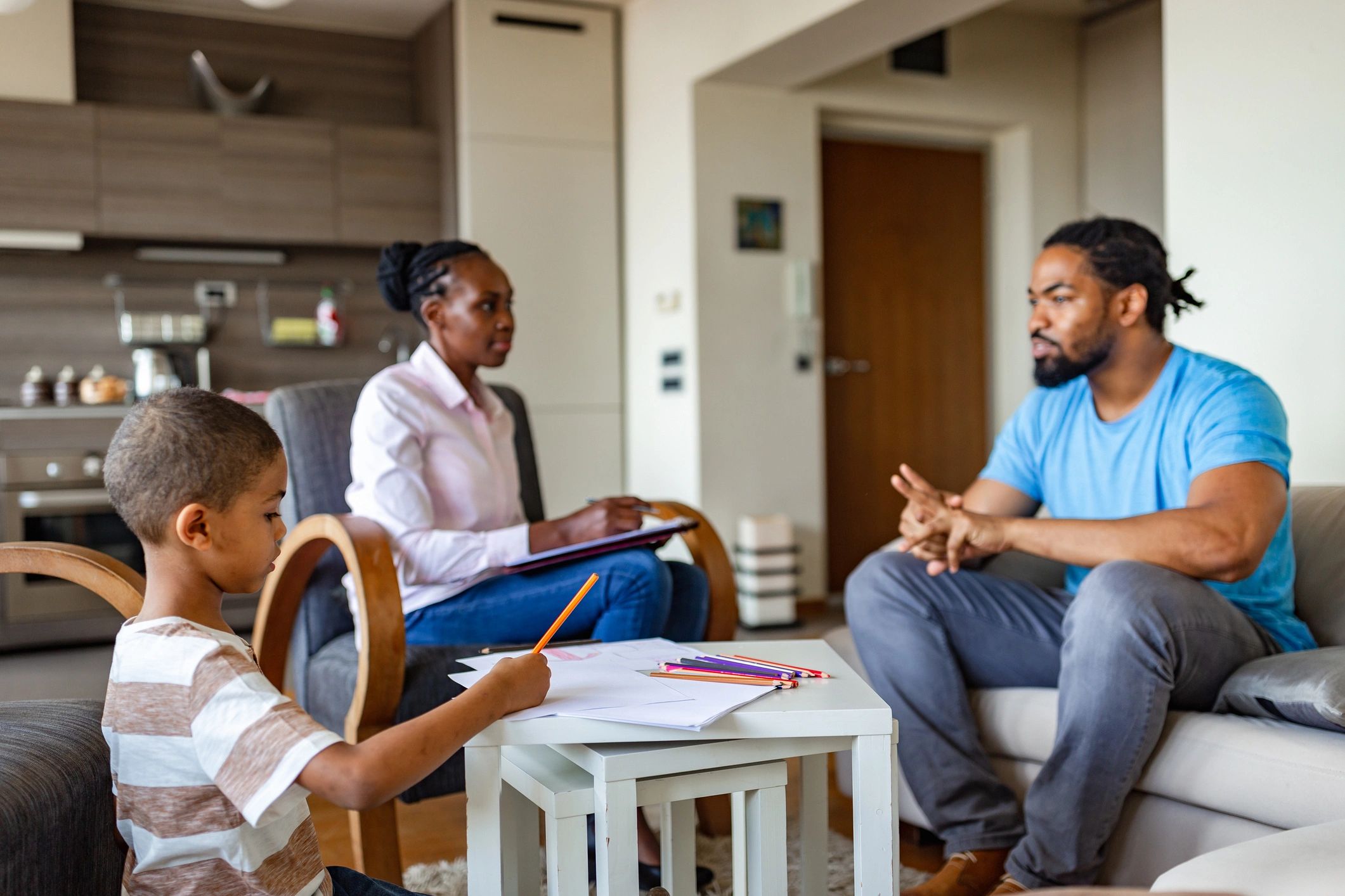 Family conversation in a living room